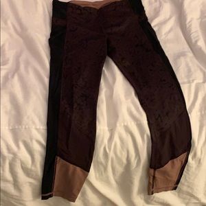 Burgundy/black patterned Lululemon tights